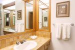 There`s more than enough room for everyone to get ready for the day in this large master bathroom